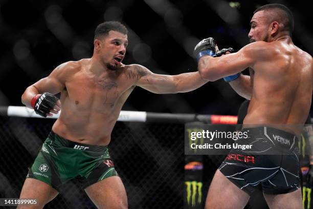 Drakkar Klose punches Rafa Garcia in a lightweight fight during the UFC 277 event at American Airlines Center on July 30, 2022 in Dallas, Texas.