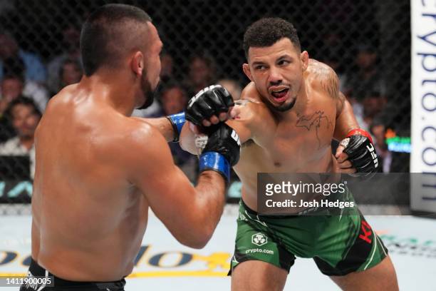 Drakkar Klose punches Rafa Garcia in a lightweight fight during the UFC 277 event at American Airlines Center on July 30, 2022 in Dallas, Texas.
