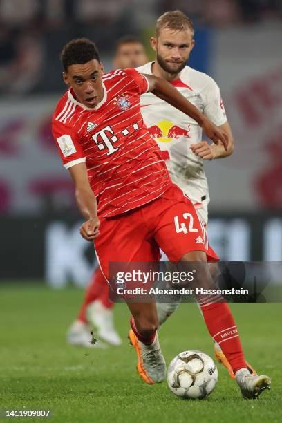 Jamal Musiala of FC Bayern München battles for the ball with Konrad Laimer of Leipzig during the Supercup 2022 match between RB Leipzig and FC Bayern...