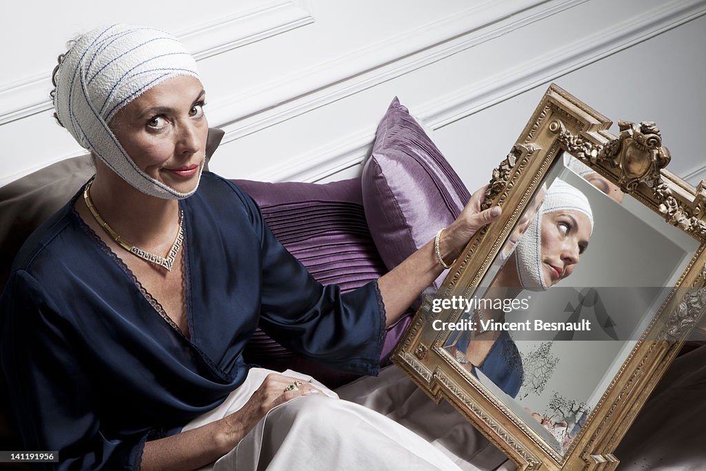 Senior woman after cosmetic surgery