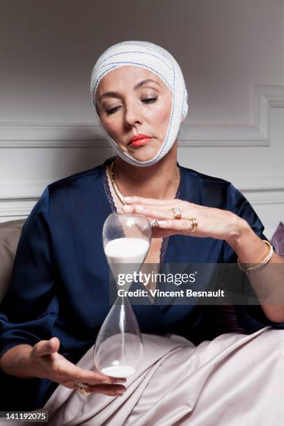 trying to reverse the aging process - reverse ageing stock pictures, royalty-free photos & images