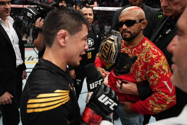 Brandon Moreno of Mexico and Deiveson Figueiredo of Brazil interact after Moreno defeated Kai Kara-France of New Zealand in the interim UFC flyweight...