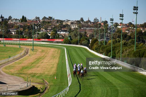 General view as the field heads down the Dean Street side of the track in Race 4, the Dominant Plant Powered Cleaning Handicap, during Melbourne...