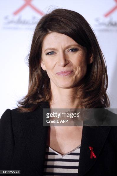 French TV host Magali Lunel poses on March 12, 2012 as she arrives at ...