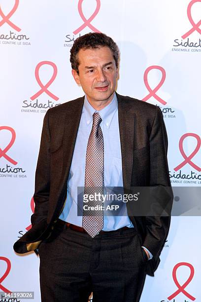 French professor and President of the Scientific and Medical Committee of Sidaction, Yves Levy poses on March 12, 2012 as he arrives at the Quai...