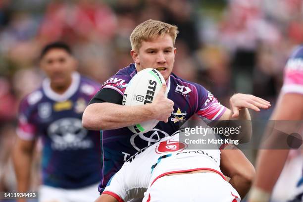 Tom Dearden of the Cowboys is tackled during the round 20 NRL match between the St George Illawarra Dragons and the North Queensland Cowboys at...