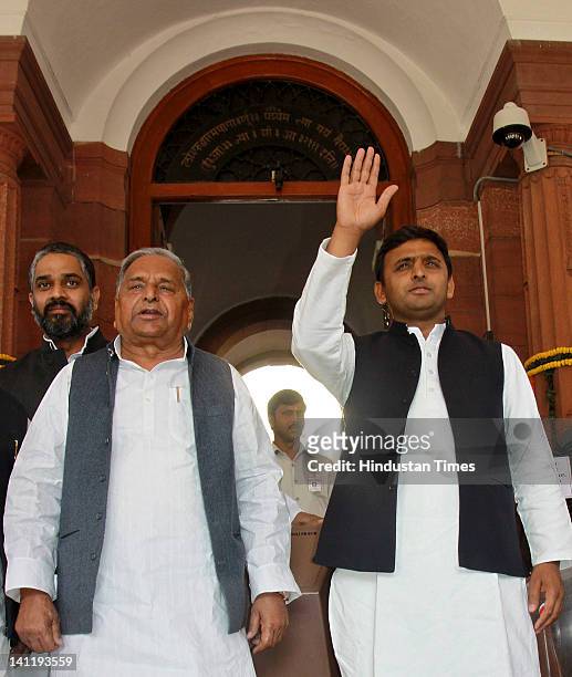 Samajwadi Party chief Mulayam Singh Yadav along with his son and UP Chief Minister-designate Akhilesh Yadav attending joint session of Parliament on...