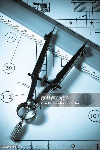 Drafting Looking Ruler Drafting Compass And Ruler Against A Blueprint High-Res Stock Photo ...