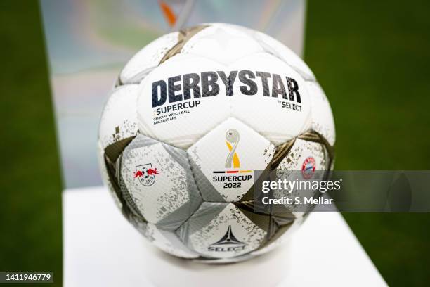 The official match ball is displayed prior the Supercup 2022 match between RB Leipzig and FC Bayern München at Red Bull Arena on July 30, 2022 in...