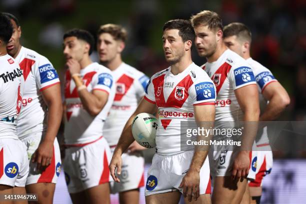 Ben Hunt of the Dragons and team mates look dejected after a Cowboys try during the round 20 NRL match between the St George Illawarra Dragons and...