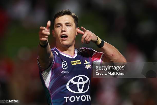 Scott Drinkwater of the Cowboys celebrates scoring a try during the round 20 NRL match between the St George Illawarra Dragons and the North...