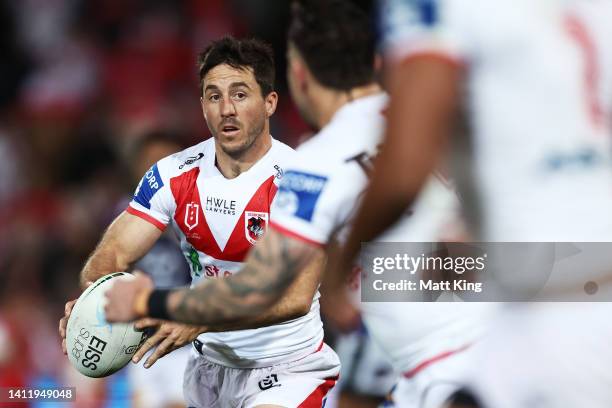 Ben Hunt of the Dragons passes during the round 20 NRL match between the St George Illawarra Dragons and the North Queensland Cowboys at Netstrata...