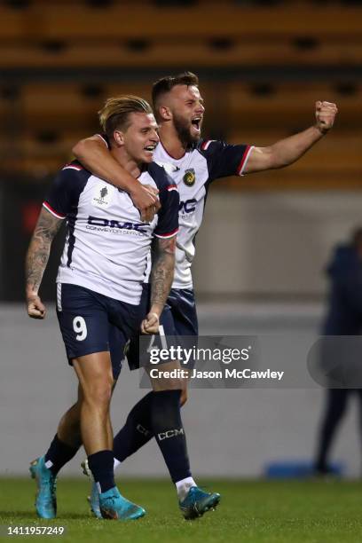 Jason Cummings and Michael Ruhs of the Mariners celebrate a goal during the Australia Cup Rd of 32 match between Sydney FC and Central Coast Mariners...