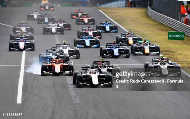 Marcus Armstrong of New Zealand and Hitech Grand Prix leads the field into turn one at the start during the Round 10:Budapest Feature race of the...