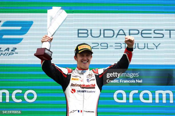 Race winner Theo Pourchaire of France and ART Grand Prix celebrates on the podium during the Round 10:Budapest Feature race of the Formula 2...