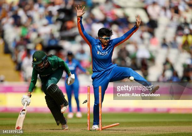 Shafali Verma of Team India takes evasive action as Aliya Riaz of Team Pakistan is run out during the Cricket T20 Preliminary Round Group A match...