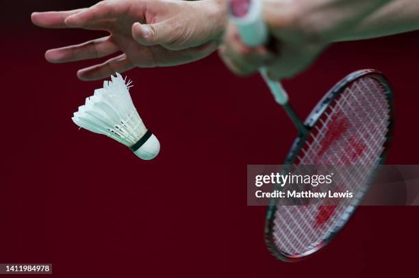 Detailed view of a racket and shuttlecock service during Badminton on day three of the Birmingham 2022 Commonwealth Games at NEC Arena on July 31,...