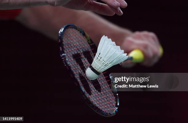 Detailed view of a racket and shuttlecock during a service during Badminton on day three of the Birmingham 2022 Commonwealth Games at NEC Arena on...