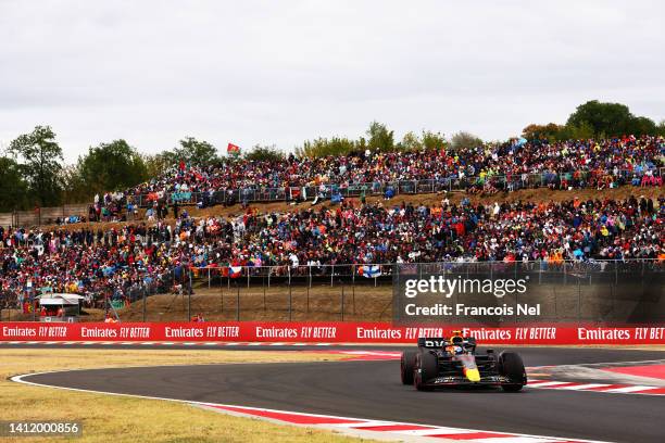 Sergio Perez of Mexico driving the Oracle Red Bull Racing RB18 on track during the F1 Grand Prix of Hungary at Hungaroring on July 31, 2022 in...