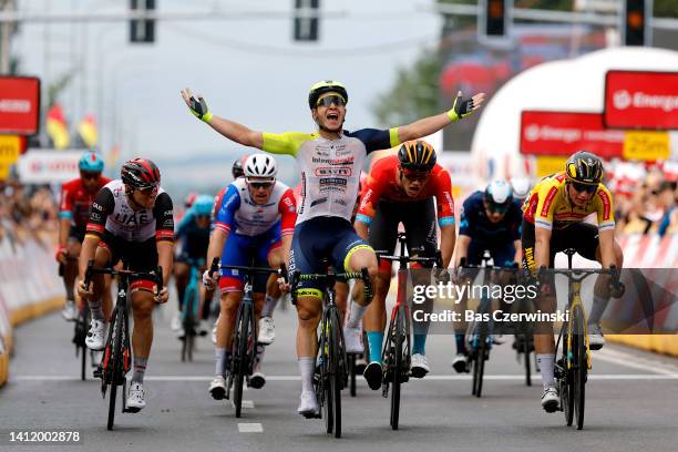 Gerben Thijssen of Belgium and Team Intermarché - Wanty - Gobert Matériaux celebrates at finish line as stage winner ahead of Pascal Ackermann of...