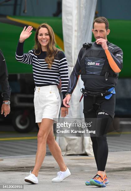 Sir Ben Ainslie and Catherine, Duchess of Cambridge during her visit to the 1851 Trust and the Great Britain SailGP Team on July 31, 2022 in...