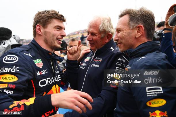 Race winner Max Verstappen of the Netherlands and Oracle Red Bull Racing celebrates with Red Bull Racing Team Principal Christian Horner and Red Bull...