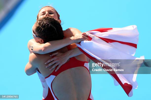 Georgia Taylor-Brown and Sophie Coldwell of Team England celebrate after winning gold in Triathlon Mixed Team Relay Final on day three of the...