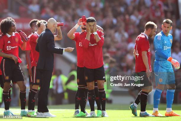 Manchester United manager Erik ten Hag chats with Christiano Ronaldo of Manchester United during the Pre-Season Friendly match between Manchester...