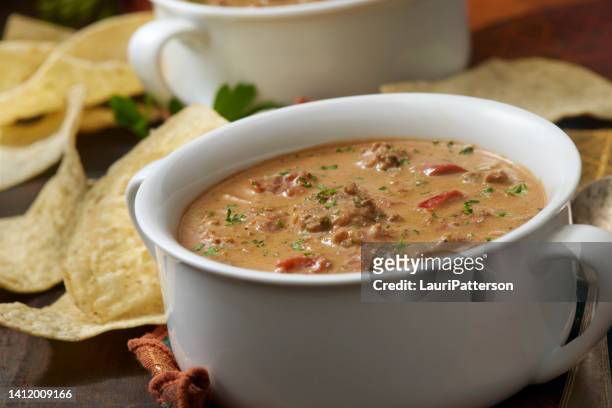cheesy beef taco soup - ground beef stew stock pictures, royalty-free photos & images
