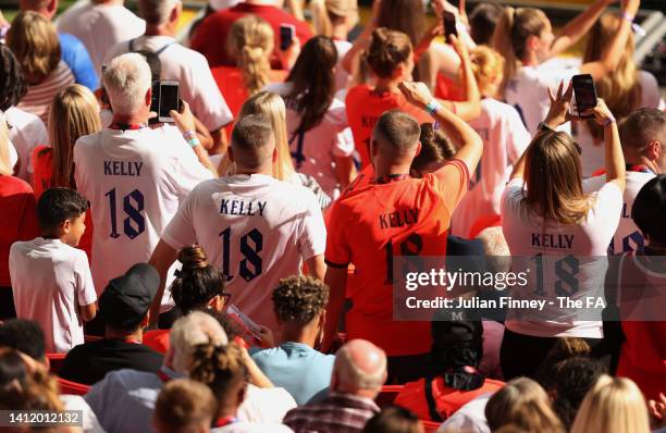 England fans wearing a shirt with Chloe Kelly on the back look on during the UEFA Women's Euro 2022 final match between England and Germany at...