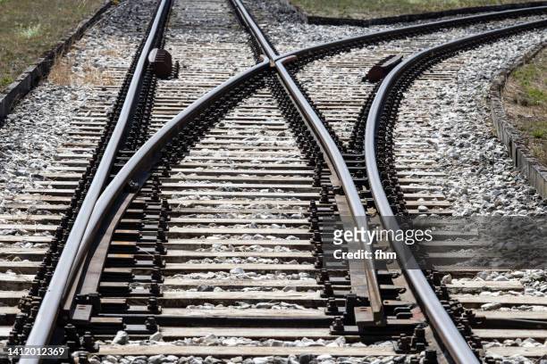 switch at a railroad track - track ストックフォトと画像