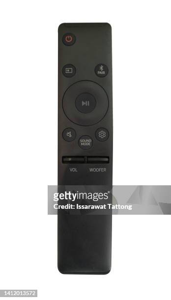 a modern tv remote control on white background. top view - remote stock pictures, royalty-free photos & images