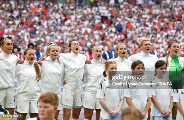 Players of England sing the national anthem prior to the UEFA Women's Euro 2022 final match between England and Germany at Wembley Stadium on July...