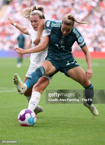 Lauren Hemp of England battles for possession with Giulia Gwinn of Germany during the UEFA Women's Euro 2022 final match between England and Germany...