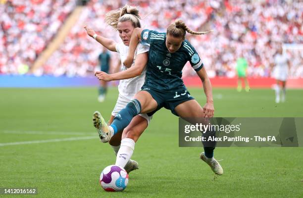 Lauren Hemp of England battles for possession with Giulia Gwinn of Germany during the UEFA Women's Euro 2022 final match between England and Germany...