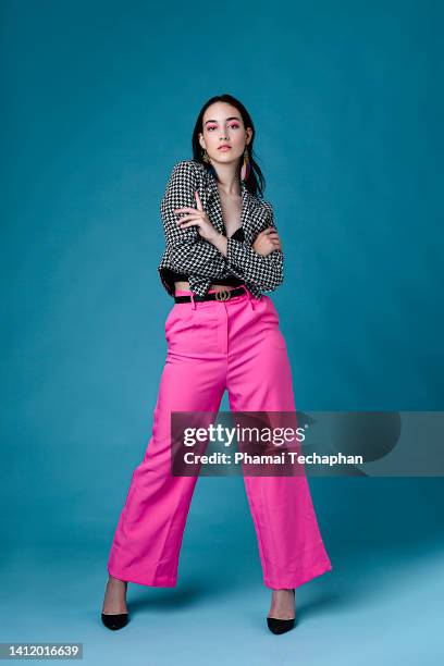 fashionable young woman - pink blazer stock pictures, royalty-free photos & images