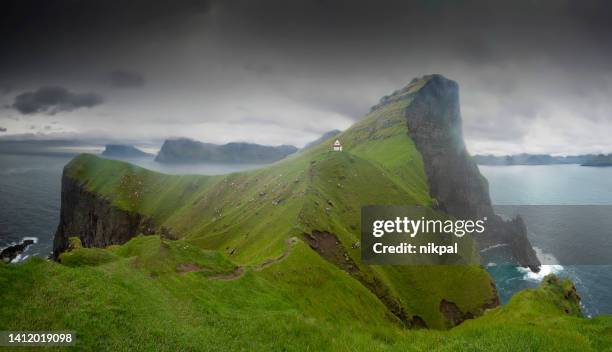 kallur lighthouse panoramic view at kalsoy island - faroe island - mountain peak with flag stock pictures, royalty-free photos & images