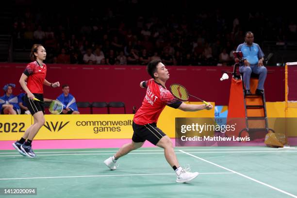 Yong Kai Terry Hee and Jessica Wei Han Tan of Team Singapore compete during the Badminton Mixed Doubles, Mixed Team Quarter-Final between Team...