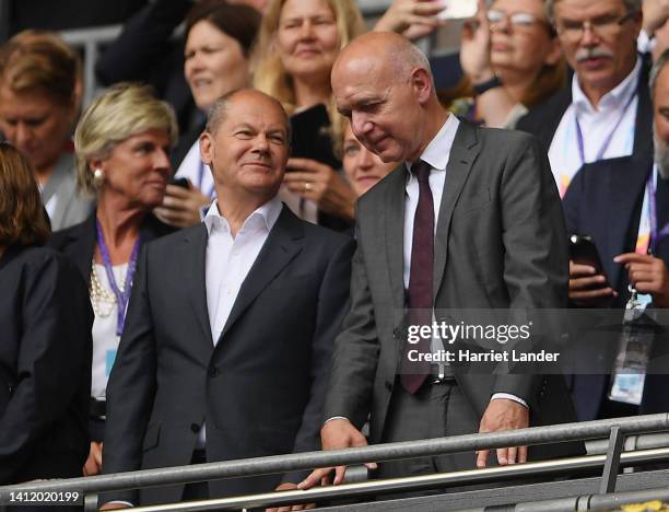 Olaf Scholz, Chancellor of Germany and Bernd Neuendorf, President of German Football Association speak prior to kick off of the UEFA Women's Euro...