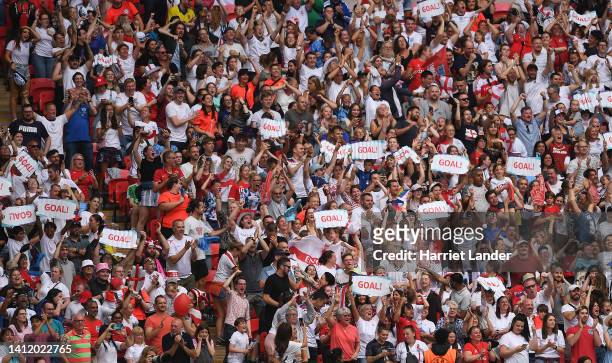 Fans of England celebrate after Ella Toone of England scores their side's first goal during the UEFA Women's Euro 2022 final match between England...