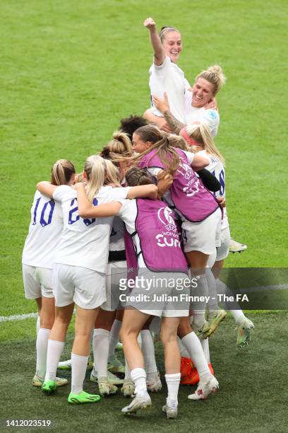 Ella Toone of England celebrates with teammates after scoring their team's first goal during the UEFA Women's Euro 2022 final match between England...