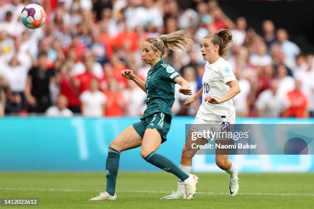 Ella Toone of England scores their side's first goal whilst under pressure from Kathrin-Julia Hendrich of Germany during the UEFA Women's Euro 2022...