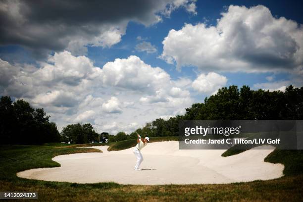 Team Captain Sergio Garcia of Fireballs GC plays an approach shot from a fairway bunker on the third hole during day three of the LIV Golf...
