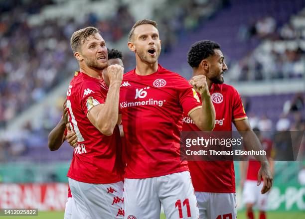 Marcus Ingvartsen of Mainz celebrates with Silvan Widmer after scoring his team's third goal during the DFB Cup first round match between Erzgebirge...