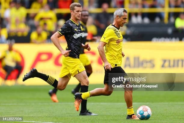 Sven Bender challenges Paulo Sousa during a legend match during the season opening of Borussia Dortmund at Signal Iduna Park on July 31, 2022 in...