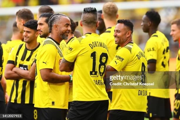 Patrick Owomoyela, Lucas Barrios and Antonio da Silva, former player of Dortmund talk during the season opening of Borussia Dortmund at Signal Iduna...