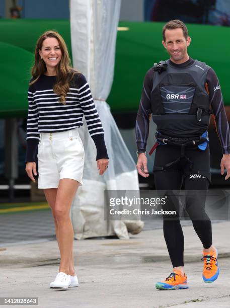 Catherine, Duchess f Cambridge and Sir Ben Ainslie are seen during her visit to the 1851 Trust and the Great Britain SailGP Team on July 31, 2022 in...