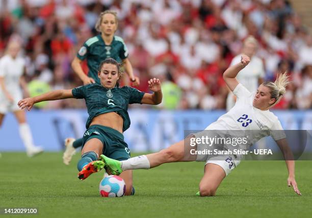 Alessia Russo of England tackles Marina Hegering of Germany during the UEFA Women's Euro 2022 final match between England and Germany at Wembley...