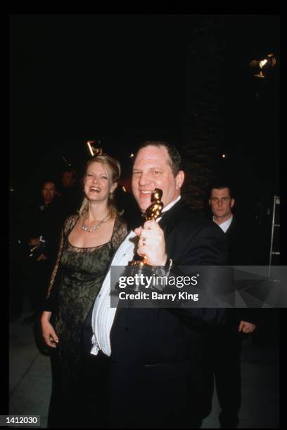 Harvey Weinstein attends the Vanity Fair Oscar party with his wife Eve Chilton Weinstein, March 21, 1999 in Los Angeles, CA. The party, organized by...