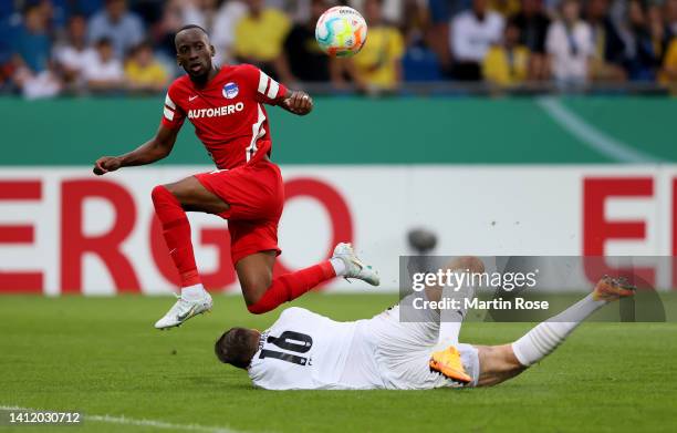 Dodi Lukebakio of Hertha BSC scores the 4th goal during extra time over Jasmin Fejzic, goalkeeper of Eintracht Braunschweig during the DFB Cup first...